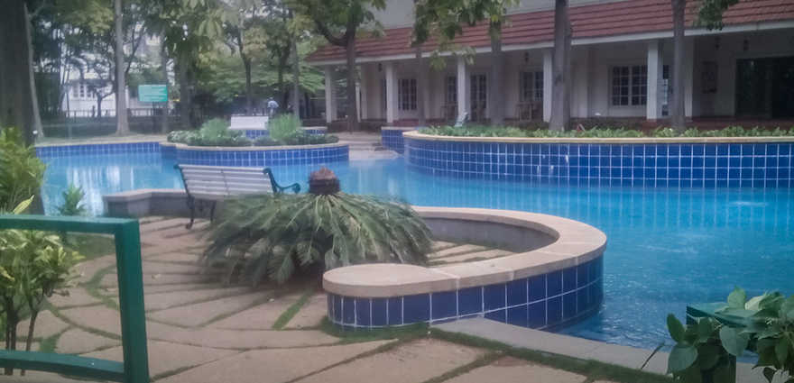 Adarsh Urbanite living room with balcony view