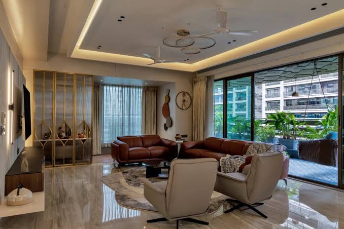 Adarsh Urbanite clubhouse with swimming pool and deck